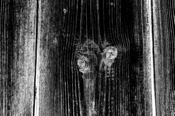 Old plank wooden wall background. The texture of old wood. Weathered piece of wood.