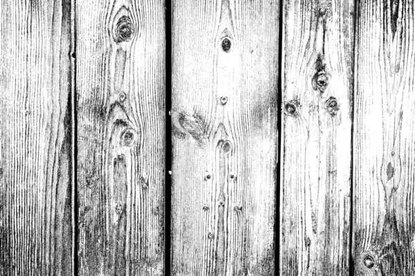 Old plank wooden wall background. The texture of old wood. Weathered piece of wood.