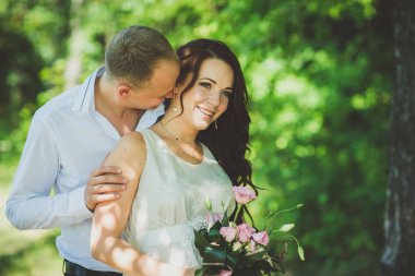 parkta sarılma güzel genç Çift