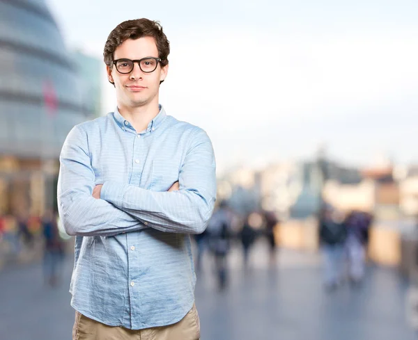 Satisfied guy with crossed arms