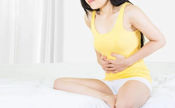 Young Asian Woman Wearing Yellow Undershirt Sitting White Bed Window — Stock Photo, Image