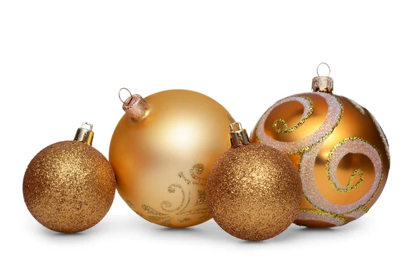 Group of gold christmas balls isolated on white background — ストック写真