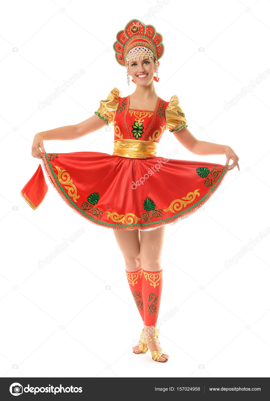 Beautiful smiling girl in traditional russian costume isolated o