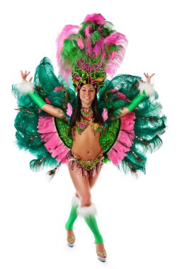 Güzel kız bir renkli karnaval kılık gülümseyen