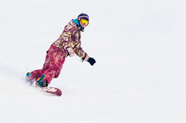 Young girl snowboarder on the board — Stock Photo, Image