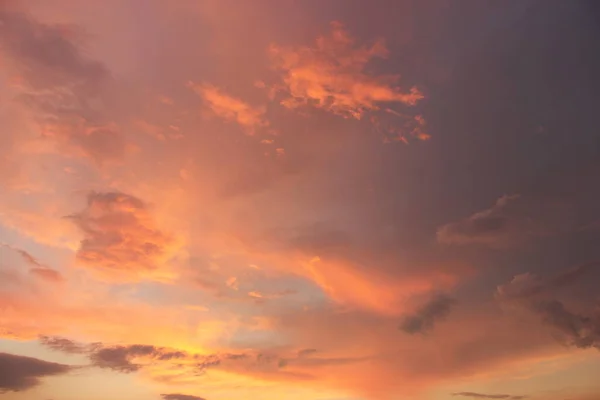 Sky in the pink and blue colors. effect of light pastel colored of sunset clouds cloud on the sunset sky background with a pastel color.Beautiful pink pastel summer real sunset.