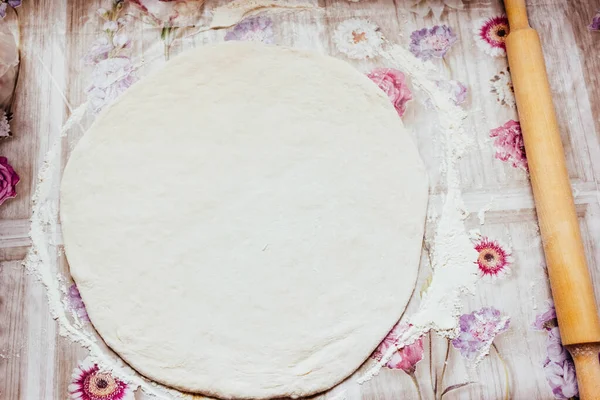 DIY pizza. homemade pizza step by step instruction.pizza step 1 roll out the pizza dough.