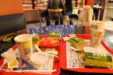 macdonald's packaging. children's crafts at macdonald's while waiting. Moscow, Russia - 20.11.2017. clipart