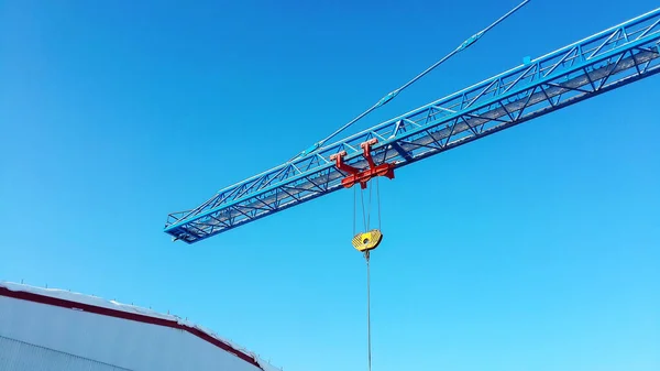 Blue crane arrow against the sky