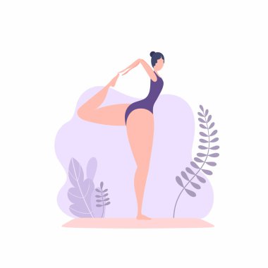 Kız tek ayak üstünde durarak yoga yapıyor.. 