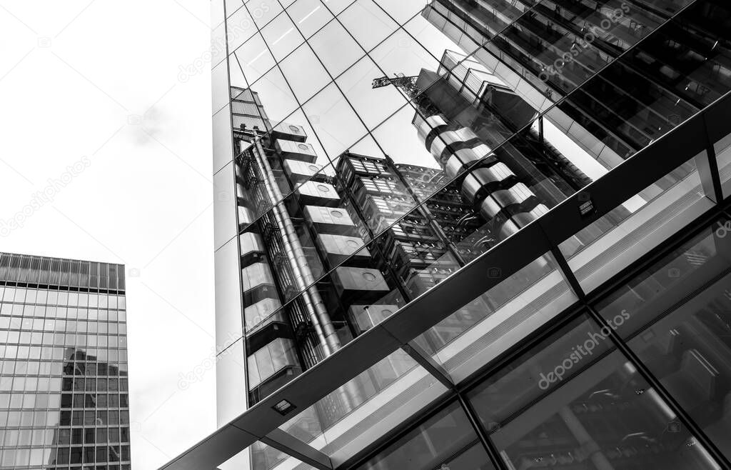 Monochrome View of Reflection of Modern Building in Glass, London UK