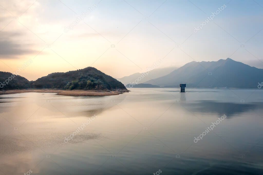 Idle Tower in Serene Lake at Dusk with Reflections in Plover Cove, Hong Kong