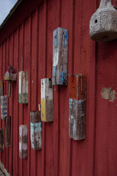 Rote Hauswand im Rockport-Hafen lizenzfreie Stockbilder