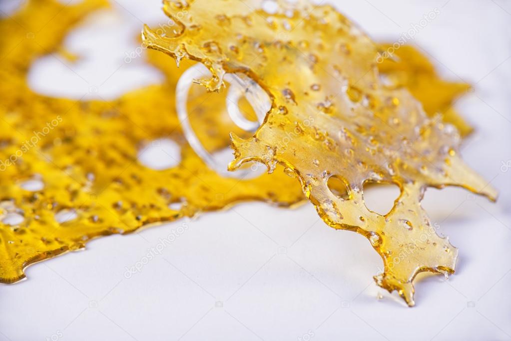 Cannabis oil concentrate aka shatter with glass rig