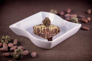 Weed brownie plate with cacao beans clipart