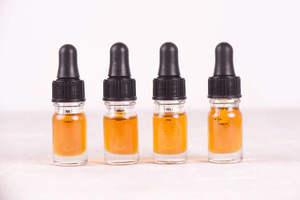 Vials of CBD oil, cannabis live resin extraction isolated on whi — Stock Photo, Image