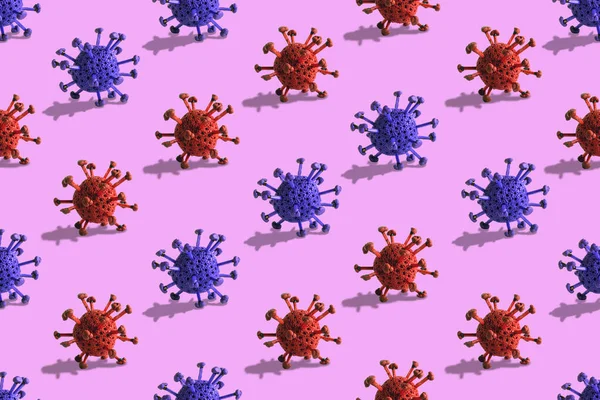 Seamless virus pattern on the pink background. Red and blue viruses. Model of virus made from plasticine. Theme of health care, medical treatment and disease prevention.