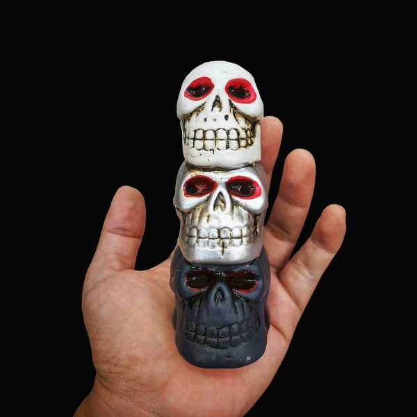 Mini Skulls Red Eyes Human Hand Isolated Black Background Colors — Stock Photo, Image