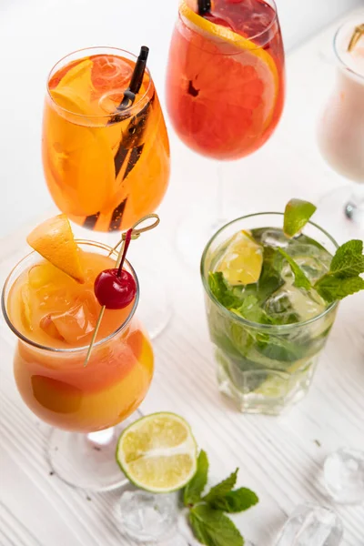 Various cocktails on a white background