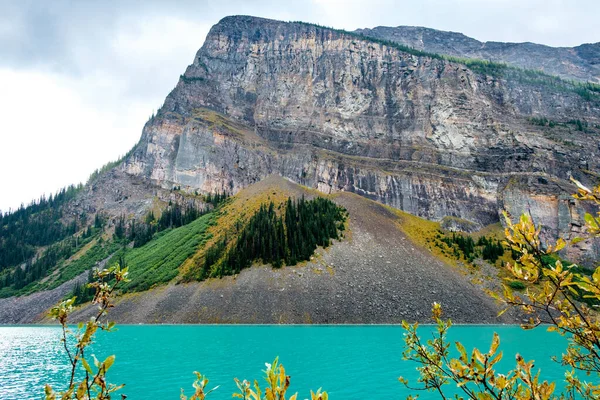 Louise Lake triangles surrounding mountains, Alberta, Canada. — Stock Image Louise Lake Triangles Surrounding Mountains Alberta Canada Stock Image