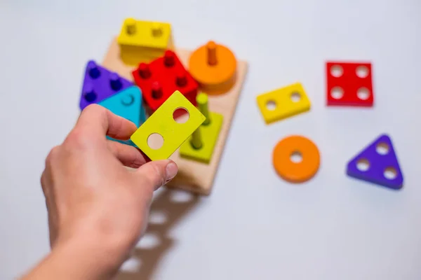 Kinderspeelgoed Gemaakt Van Hout Een Witte Achtergrond Close Het Kind — Stockfoto