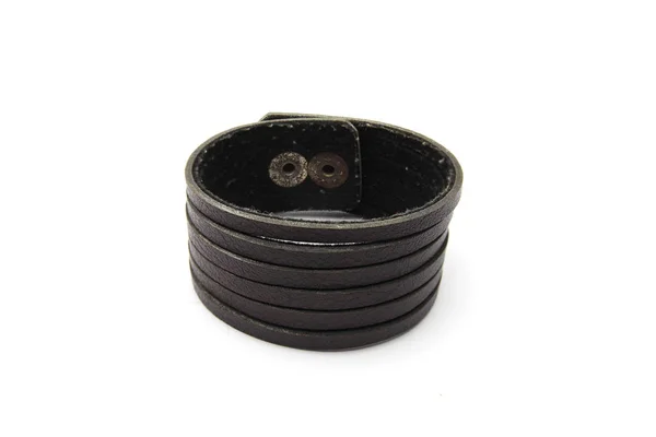 Black bracelet on white background — Stock Photo, Image