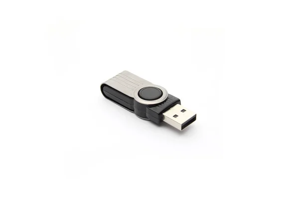 Een geïsoleerde flash drive op witte achtergrond — Stockfoto