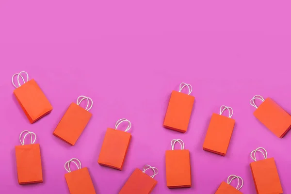 Muchas Bolsas Compras Rojas Sobre Fondo Rosa Espacio Copia Concepto — Foto de Stock