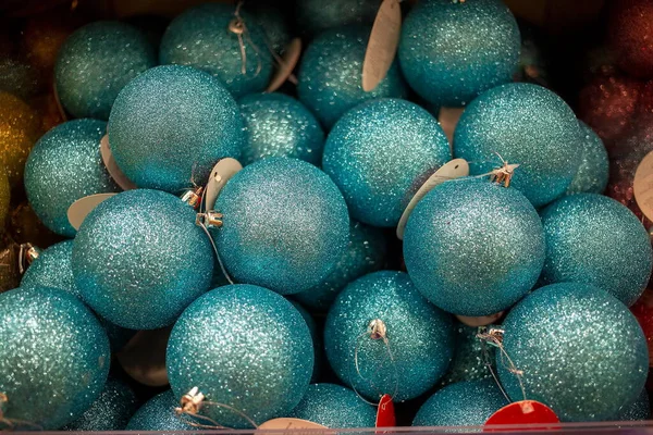 Texture New year blue shiny christmas toys balls, decorations for christmas tree. close-up, soft focus. — Stock Photo, Image