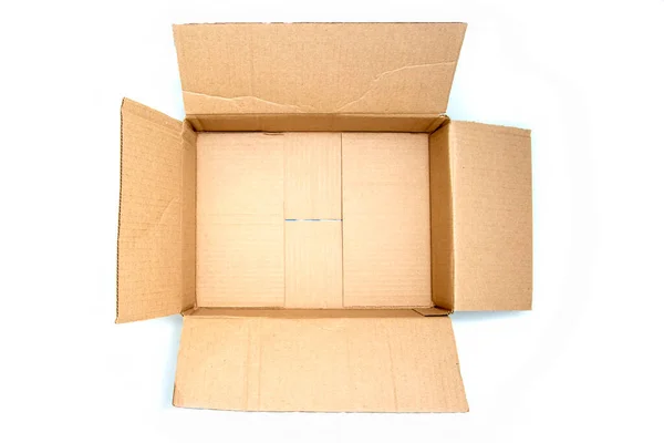 Top view: open empty cardboard box with space for copy space. concept: moving, packaging, gift. isolated — Stock Photo, Image