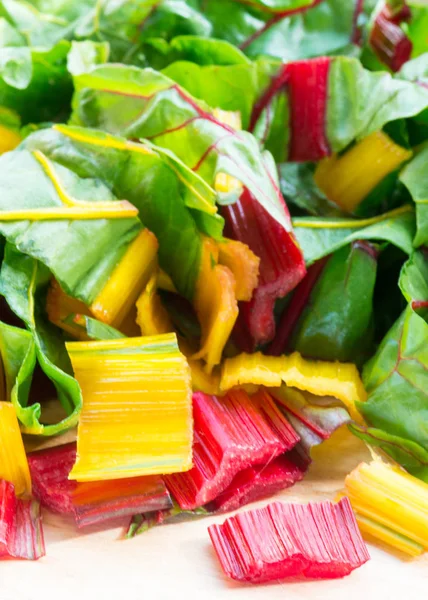 Vertical image of chopped red and yellow chard, — Stock Photo, Image