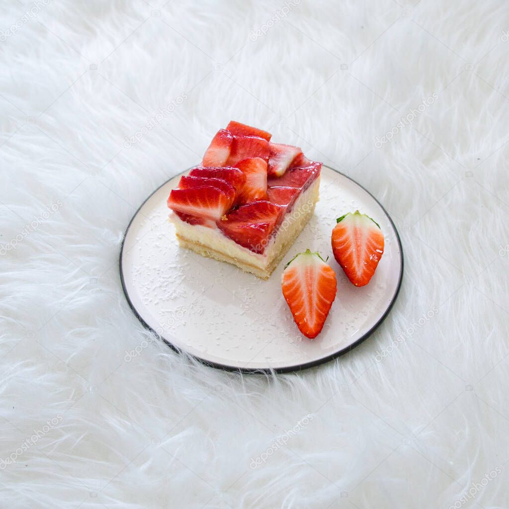 Fresh sweet vanilla tart with strawberries