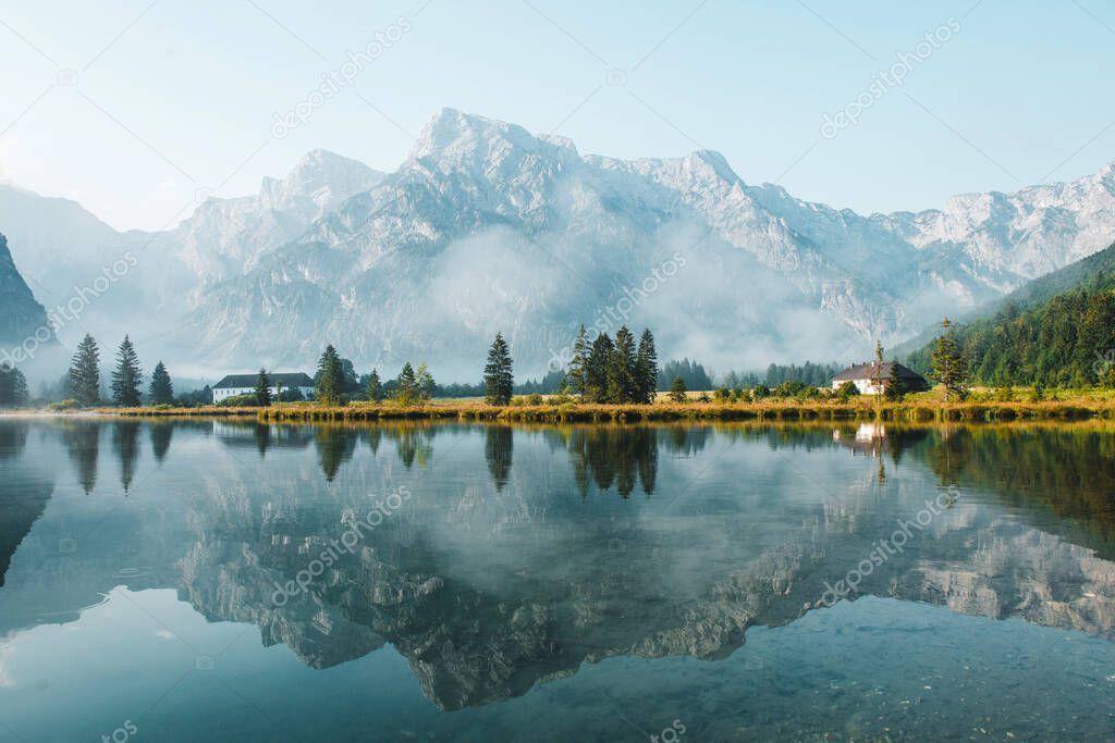 Mirror reflection in Almsee lake, Austria