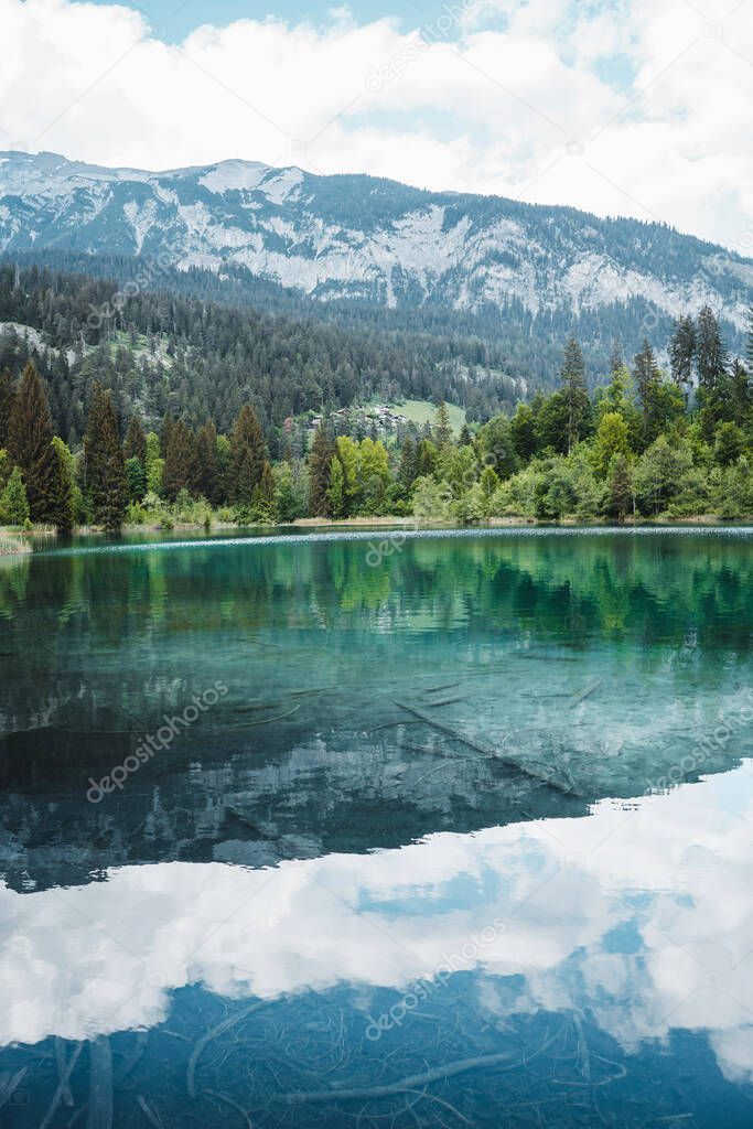 Crystal clear Lake Crestasee in the middle of the woods