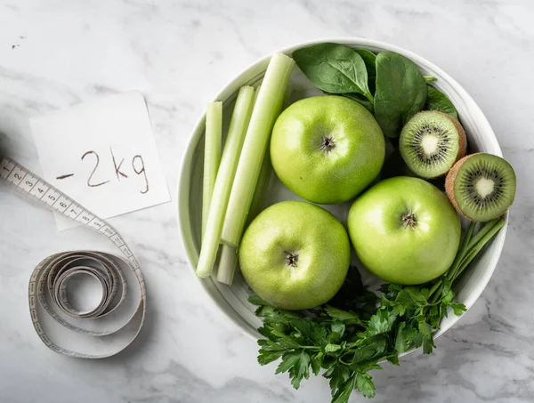 Green fruits and vegetables for making detox smoothie.