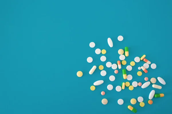 Färgglada Piller Och Kapslar Blå Grön Bakgrund Tabletter Utspridda Från — Stockfoto
