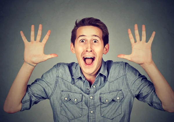 Happy young man going crazy screaming super excited surprised — Stock Photo, Image