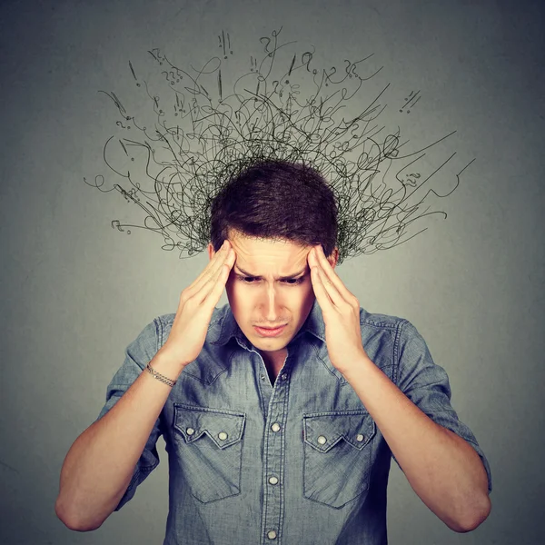 Uomo triste con volto stressato espressione cervello scioglimento in linee — Foto Stock