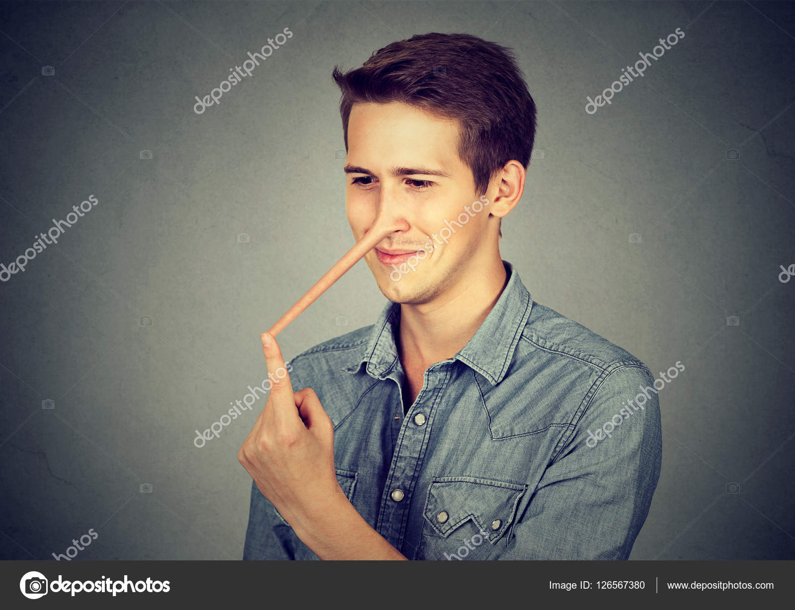 Man with long nose. Liar concept. Stock Photo by ©SIphotography 126567380