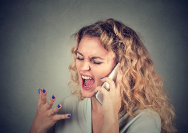 woman screaming on mobile phone