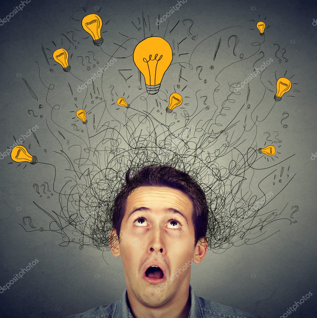Surprised man with many ideas light bulbs above head looking up — Stock Photo © SIphotography