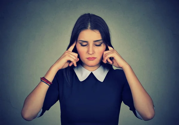 Sad woman with worried stressed face expression looking down — Stock Photo, Image