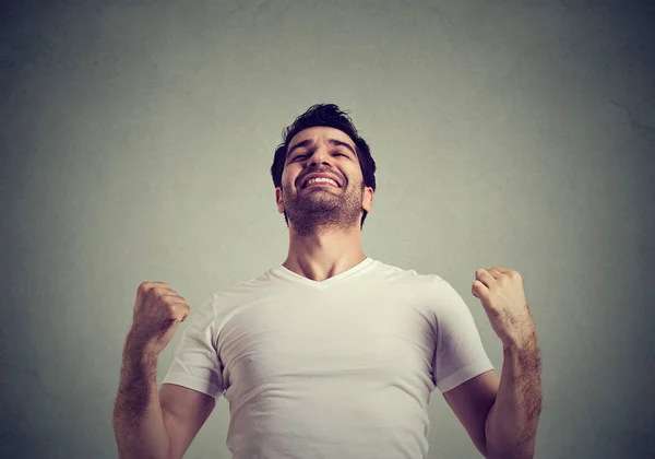 Happy successful man winning, fists pumped celebrating success — Stock Photo, Image