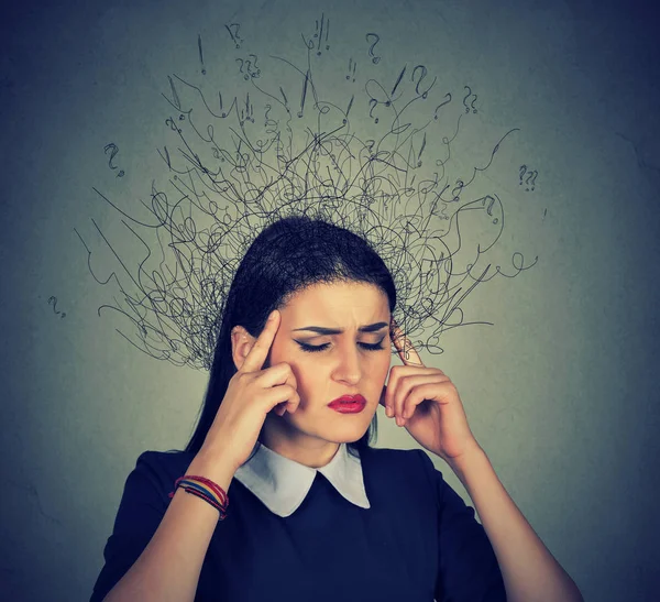 Sad young woman with worried stressed face expression — Stock Photo, Image