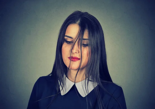 Young sad woman looking down — Stock Photo, Image