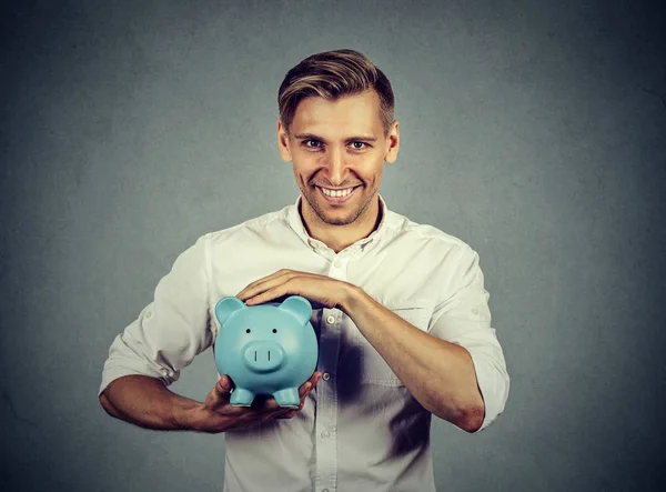 Portrait man with piggy bank — Stock Photo, Image