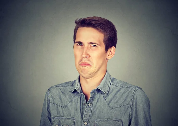 Portrait of a disgusted man — Stock Photo, Image