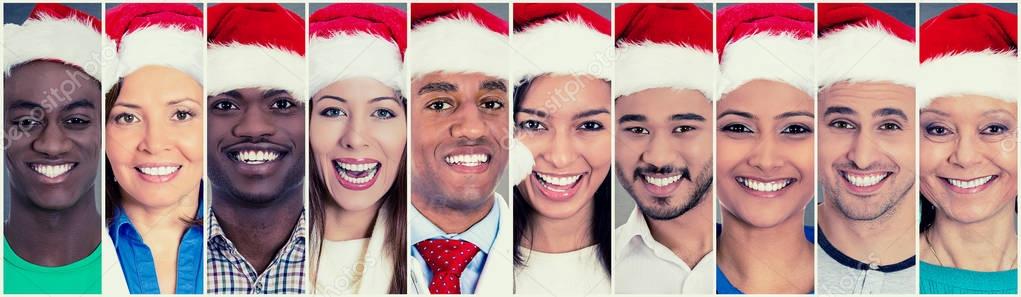 Multicultural group happy people men women in santa claus hats 