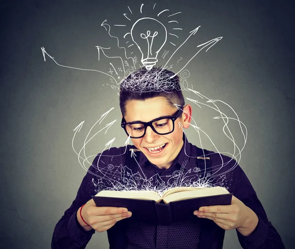 Happy man reading a book — Stock Photo, Image