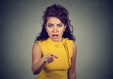 shocked terrified woman pointing finger at camera clipart